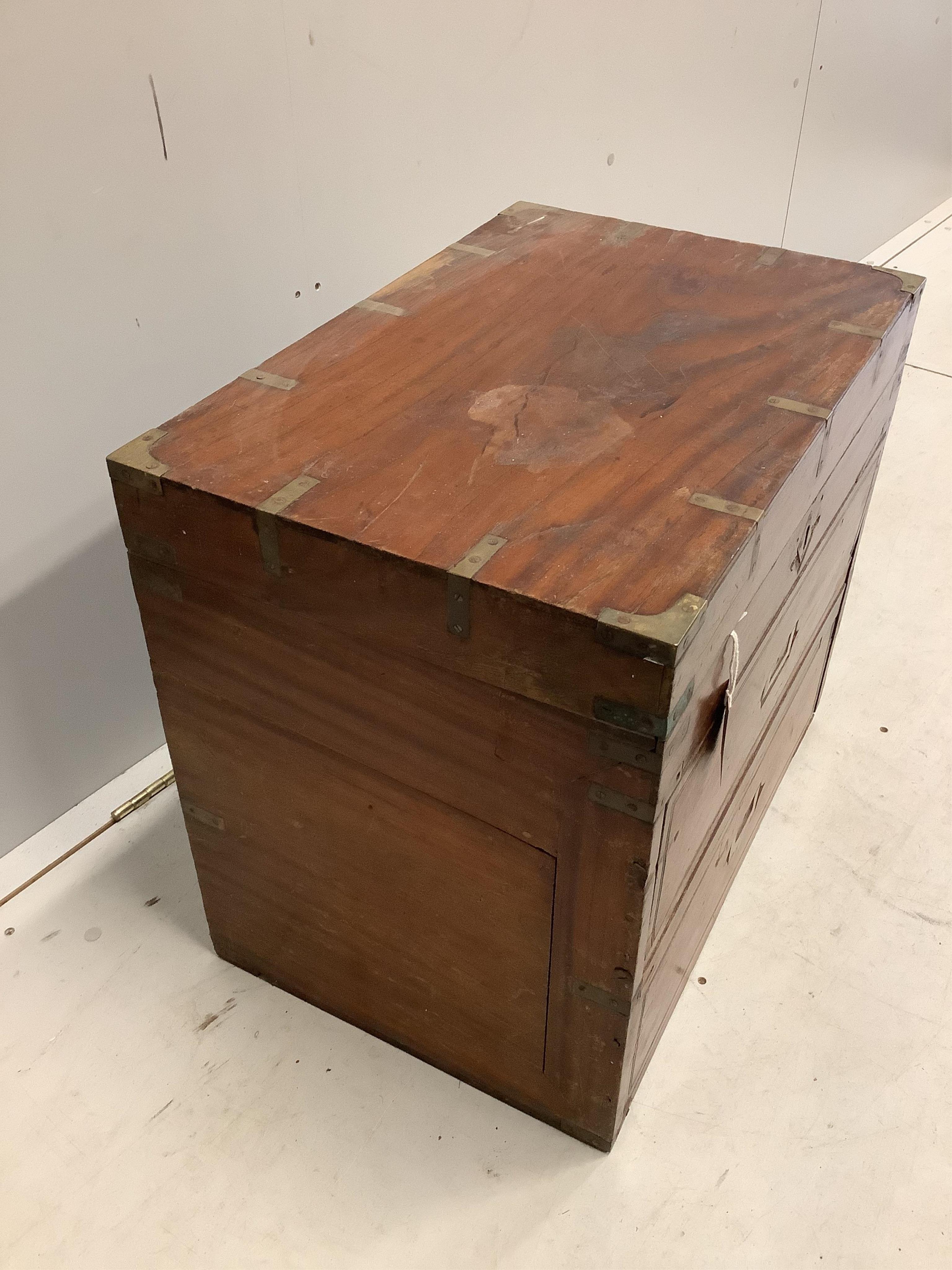 A 19th century brass mounted teak trunk with dummy drawer front, width 60cm, depth 41cm, height 54cm. Condition - fair